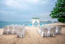 Outdoor wedding ceremony decoration with flowers on the beach