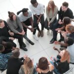 Essence of Human Gathering in the Digital Era People sitting in Human Gathering