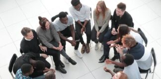 Essence of Human Gathering in the Digital Era People sitting in Human Gathering