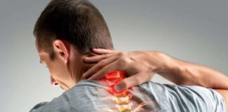 How Do Minimally Invasive Solutions Change the Game for Pain Relief? Man experiencing neck pain with visible spinal