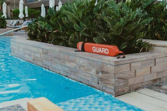 Lifeguard equipment by the poolside at a modern resort